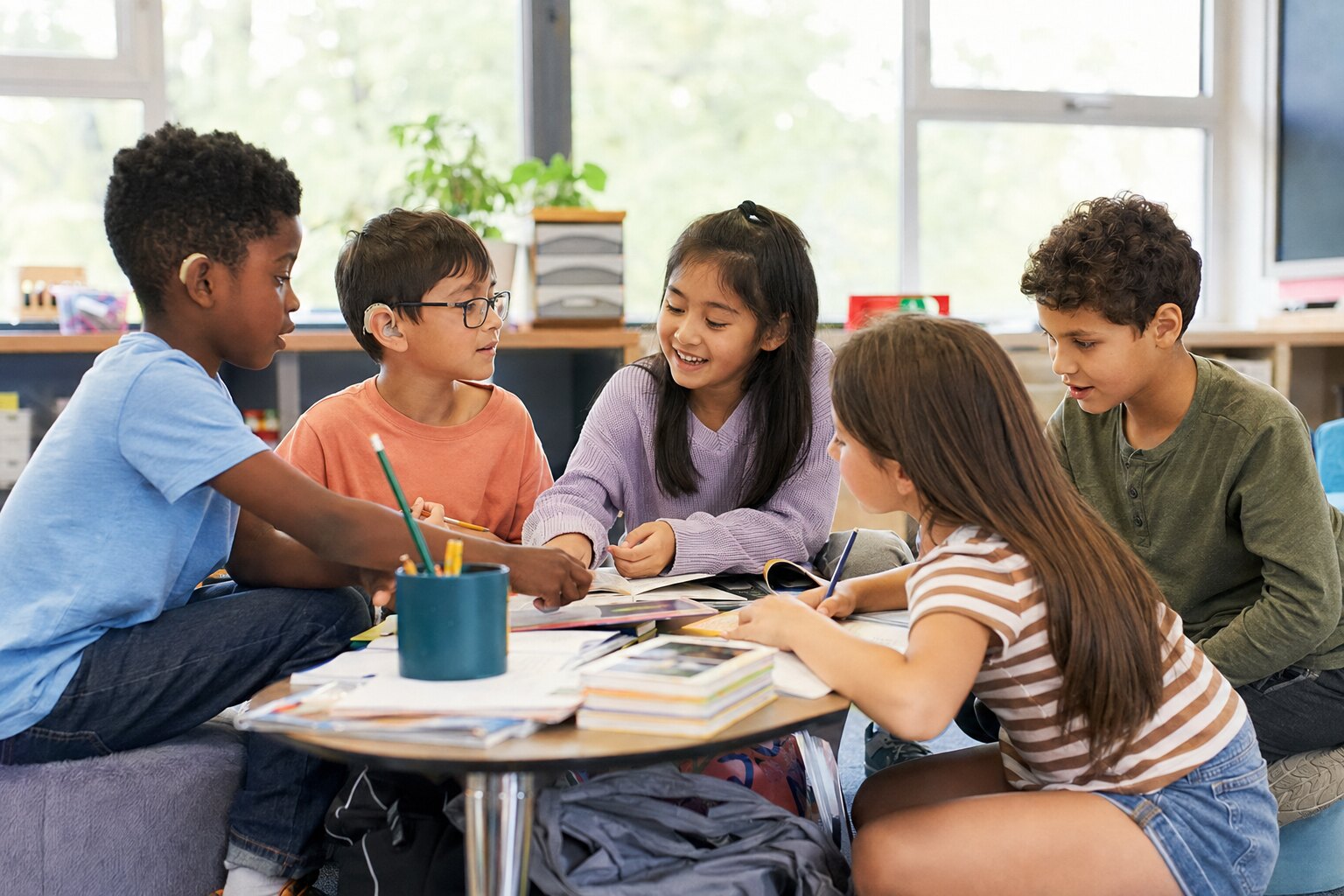 A diverse group of elementary-age students learning together in a classroom